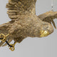Detailansicht der Design Hängeleuchte Parrot mit goldener Vogelgestaltung für kreative Lichtakzente.