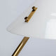 Detailansicht der Design Tischleuchte Soul aus Marmor mit goldener Halterung und eleganter Form.