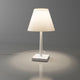 Rotaliana Dina+ Akku LED-Tischleuchte in Weiß mit Ladestation, elegantes und modernes Design.