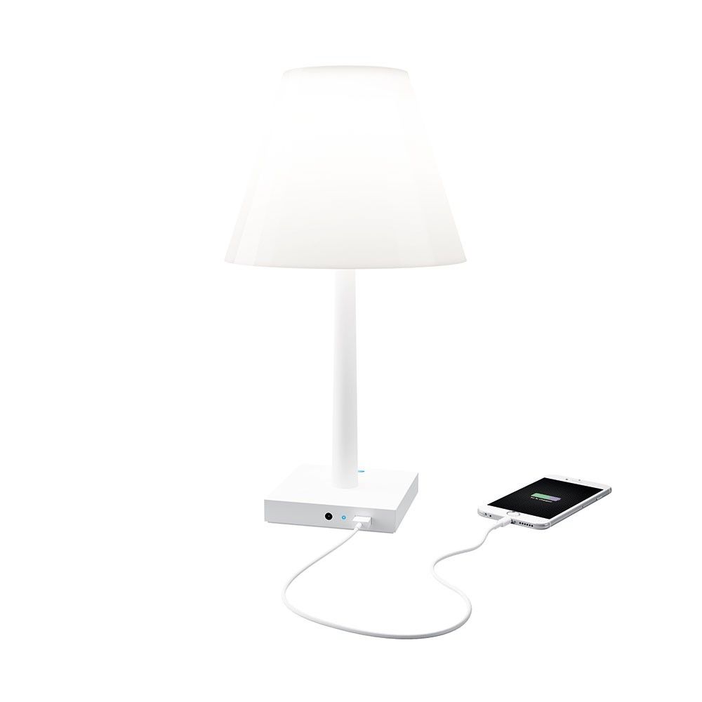 Rotaliana Akku LED-Tischlampe Dina+ mit Ladestation in Silber, ideal für modernes Ambiente und Smartphone-Ladung.