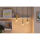 E27 3,5W LED Birne Arc 1800K Goldlicht in einer stilvollen Innenraumbeleuchtung.