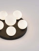 Edem Deckenleuchte 6-flammig Ø 35cm Schwarz, Weiß mit 6 Kugeln aus Milchglas auf schwarzem Grund.