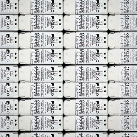 Electronic dimmable transformer LED driver 12V 0-70W in a neatly arranged layout of transformer units.