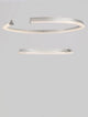 Elmo LED Pendelleuchte 2-flammig Ø 63cm 3500K Chrom in modernem Design, schwebend über einem Tisch.