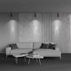 Elti Deckenlampe Spot Light über einem modernen grauen Sofa im minimalistischen Wohnbereich.