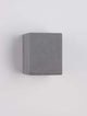 Emile LED Außenwandleuchte Cube Grau IP65 an einer Wand montiert, modernes Design in Grau.