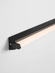 Endo LED Wandleuchte 3000K Schwarz IP44 an einer Wand installiert, modernes und elegantes Design.