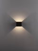 Epic LED Wandleuchte Rechteckig 3000K Schwarz an einer Wand, strahlend warmes Licht in einem modernen Design.