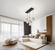 Gillis Pendelleuchte 5-flammig in modernem Wohnzimmer mit hellem Interieur und elegantem Design.