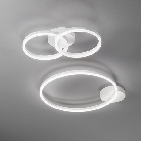 Moderne Giotto LED Wandleuchte Metall mit dimmbaren, runden Lichtringen und Smartluce Technologie.