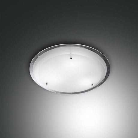 Hill Deckenleuchte aus Metall & Glas - elegante runde Deckenleuchte mit klarer Glasoberfläche.
