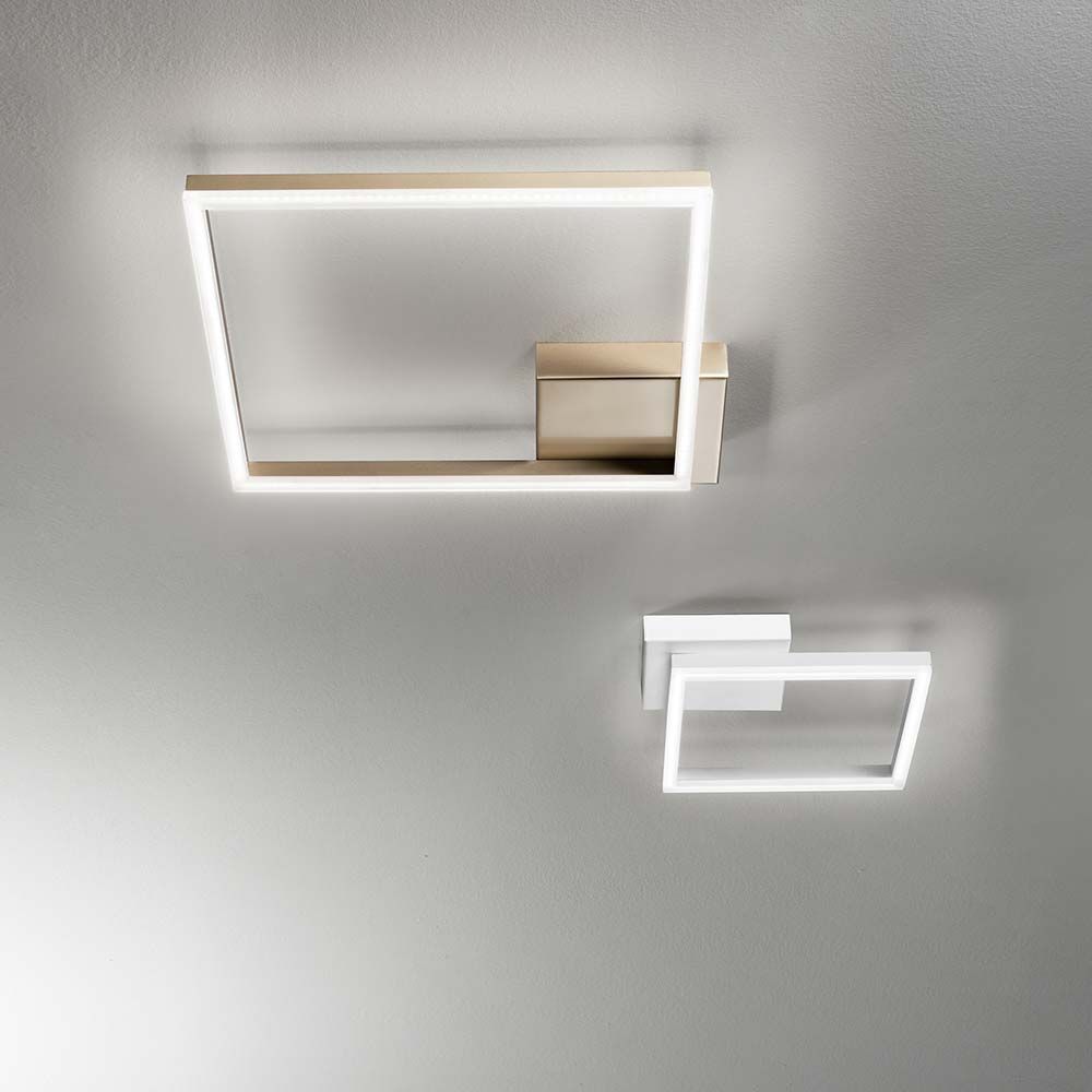 Moderne LED-Deckenleuchte Bard in Gold-Edelmatt und Weiß, ideal für Wohnräume und Esszimmer.