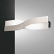LED Wandlampe Riace Metall in modernem Design an einer Wand montiert.