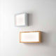 LED Wandlampe Window 2610lm Eichenholz in Holz- und Metalloptik an einer Wand.