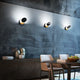 LED Wandleuchte Ara 720+360lm Schwarz in modernem Interieur, elegant und funktional.