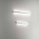 LED Wandleuchte Lotus Aluminium an einer Wand montiert, minimalistisches Design und sanfte Beleuchtung.