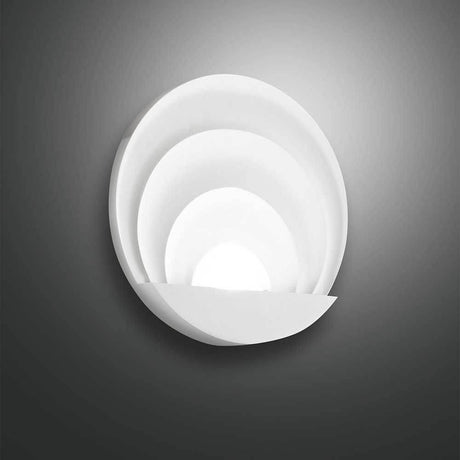 Moderne LED Wandleuchte Sunrise Ø26cm in elegantem Design an einer Wand montiert.