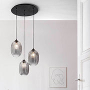 Pendelleuchte Infinity Ø 55cm in stilvollem Design mit drei Glaskugeln, ideal für moderne Wohnräume.