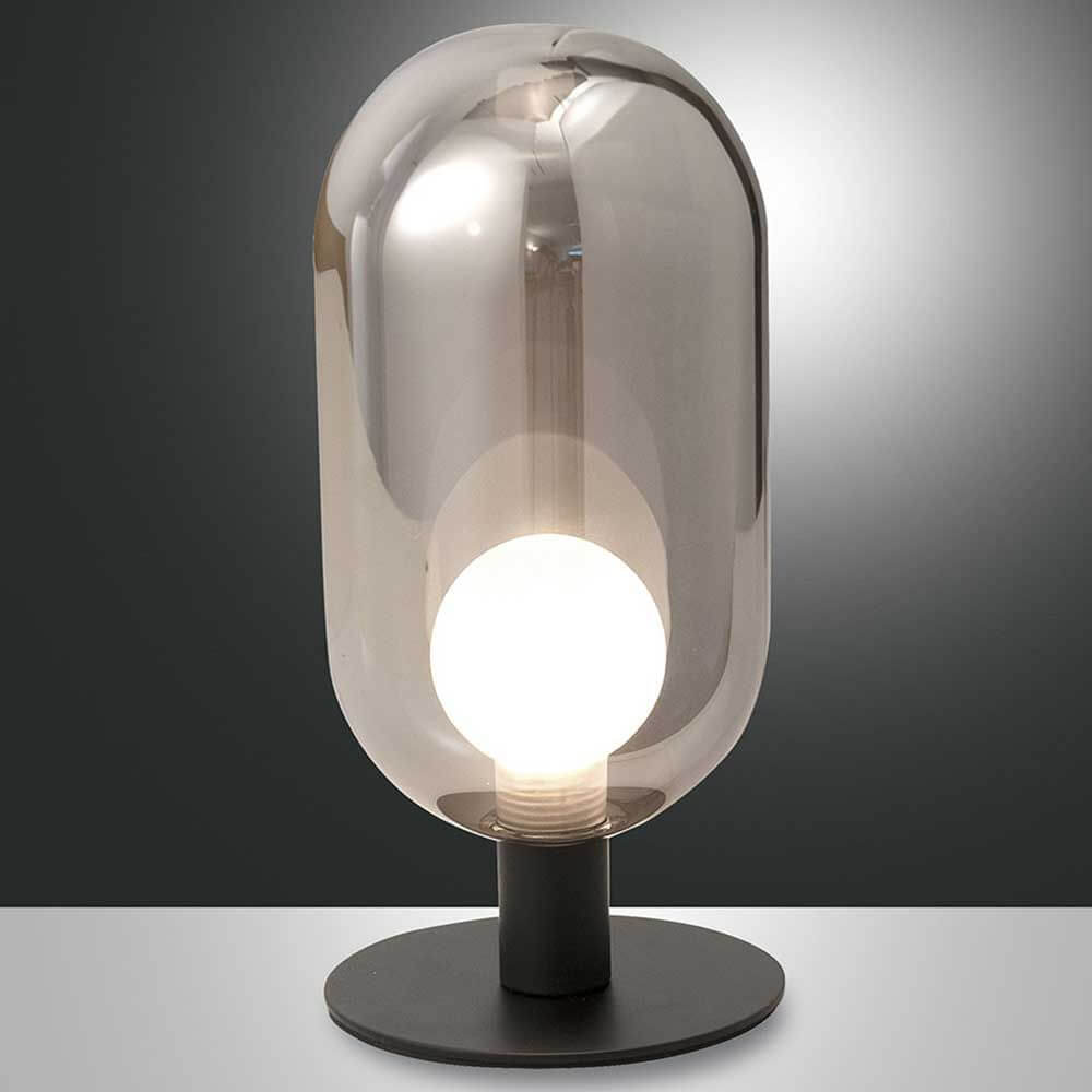 Tischleuchte Gubbio Ø 10cm mit transparentem Schirm und rundem Sockel, ideal für modernen Wohnstil.