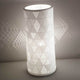 Tischleuchte Micol in Weiß - elegante Designlampe mit einzigartigem Lichtmuster und modernem Stil.