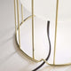 Detailansicht der Fabbian Aérostat Tischleuchte Ø 11cm mit goldene Struktur und weißem Glasschirm.