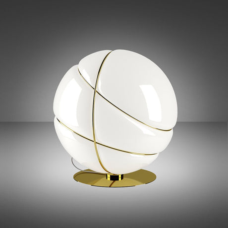 Fabbian Armilla table lamp gold in a round shape with glossy white glass and polished, gold-plated rings.