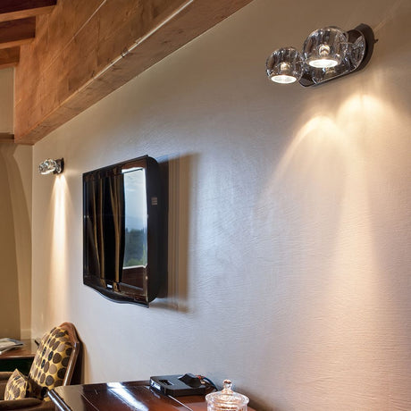 Fabbian Beluga wall and ceiling light, 2-light, on the wall with clear crystal diffuser and modern design.