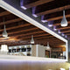 Fabbian Bijou Hängeleuchte Big in modernem Raum mit Holzdecke und stilvollem Spiegel, ideal für Wohnzimmer oder Bar.