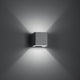 Fabbian Bijou LED-Wandlampe in elegantem design mit symmetrischen Lichteffekten auf der Wand.