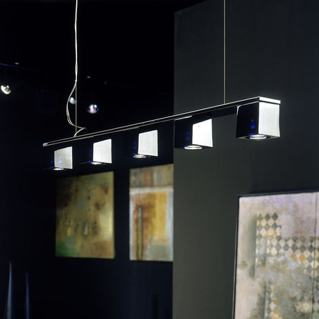 Fabbian Cubetto pendant light 5-light with modern design in a stylish room.