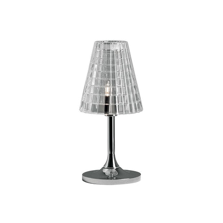 Fabbian Flow Tischleuchte aus transparentem Glas mit Chromfuß für warmes Licht im Wohnzimmer oder Schlafzimmer.