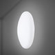 Fabbian Lumi Wandleuchte White Large an der Wand installiert, modernes Design aus weißem Glas.