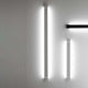 Fabbian Pivot LED-Wandleuchte Large 52W 230V in Weiß an der Wand montiert, innovative Beleuchtungslösung.
