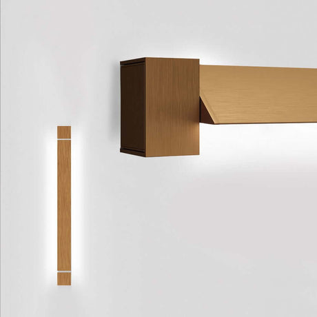 Fabbian Pivot LED wall light Small 23W 24V in warm wood design mounted on the wall.