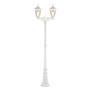Lampadaire Firenze avec 2 têtes d’éclairage blanc, verre transparent, au design élégant pour un éclairage raffiné.