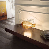 Attimo Tischlampe mit handgefertigtem Muranoglas und Stahlrahmen, kreativ in einem Käfig-Design.