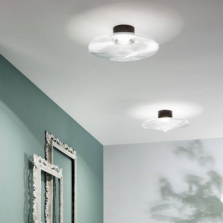 Desideria LED-Halterung Wand & Decke (ohne Glas) in modernem Raumdesign mit eleganten Leuchten.