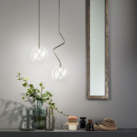 Essenza pendel brosilikatglas i moderne design med dekorative elementer og spejl.