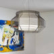 Forestier Hängelampe Mesh Ø 65cm in modernem Design, hängend in einem hellen Raum.