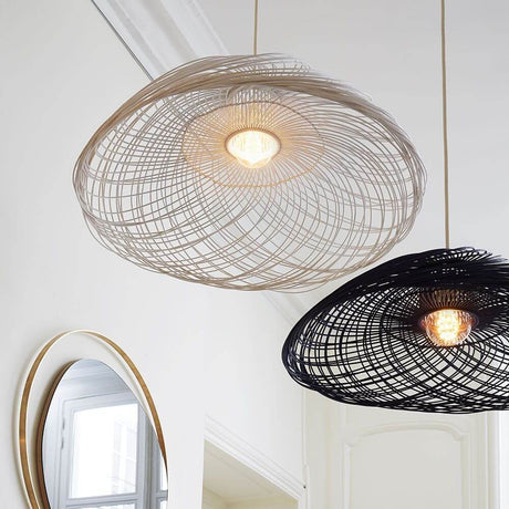 Forestier rattan pendant light Satelise with an airy, lightweight silhouette and atmospheric light.