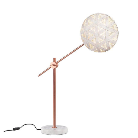 Forestier table lamp Chanpen with marble base on a modern table, copper details and a round shade.