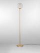 Galeo Stehlampe 3000K Gold mit schlankem Standfuß und zylindrischem Glasschirm in elegantem Goldfinish.