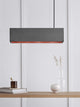Gantlights B4 LED-Pendelleuchte Beton 56cm dimmbar in elegantem Design über einer Holzoberfläche