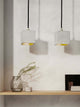 Gantlights B6 Hängelampe Beton in minimalistischer Einrichtung mit Betonvase.
