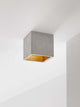 Gantlights B7 Deckenspot quadratisch dimmbar aus grauem Beton, innen vergoldet, minimalistischer Deckenstrahler