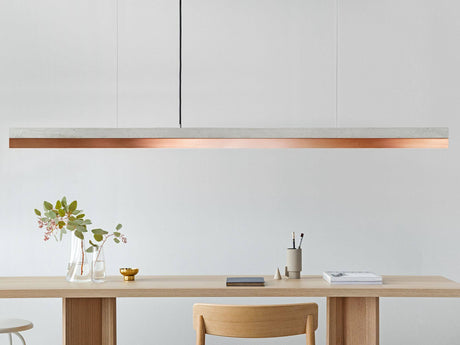 Gantlights C3 LED-Pendelleuchte dimmbar aus Beton mit Kupfereinsatz über Esstisch, minimalistisches Design, handgefertigt in Deutschland