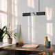 Gantlights S4 Beton LED-Pendelleuchte 61cm Plissiert über einem modernen Tisch in einem hellen Raum.