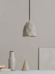 Gantlights T1 Pendelleuchte Beton aus hochwertigem Beton und edlen Metallakzenten im minimalistischen Design.
