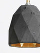 Gantlights T1 Pendelleuchte Beton mit geometrischem Betondesign und goldfarbenem Innenleben.