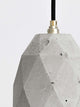 Gantlights T1 Pendelleuchte Beton aus robustem Beton mit edlen Metallakzenten.